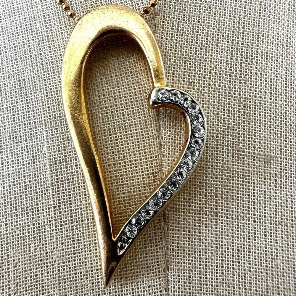 Gold tone open heart pendant necklace